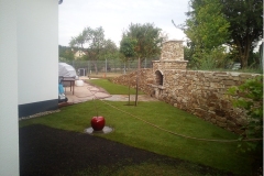 Aussenanlagen-Natursteinmauer-mit-Kamin-Langenlois-05